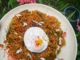 A picture of Vegetable Maggi with Poached Egg.