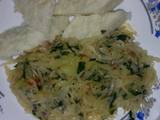 A picture of Ugali cabbage and spinach.