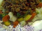 A picture of Spicy ground meat with vegetables.