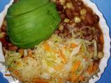 A picture of Stewed githeri with steamed cabbage.