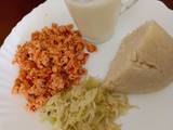 A picture of Ugali cabbage and fried eggs.