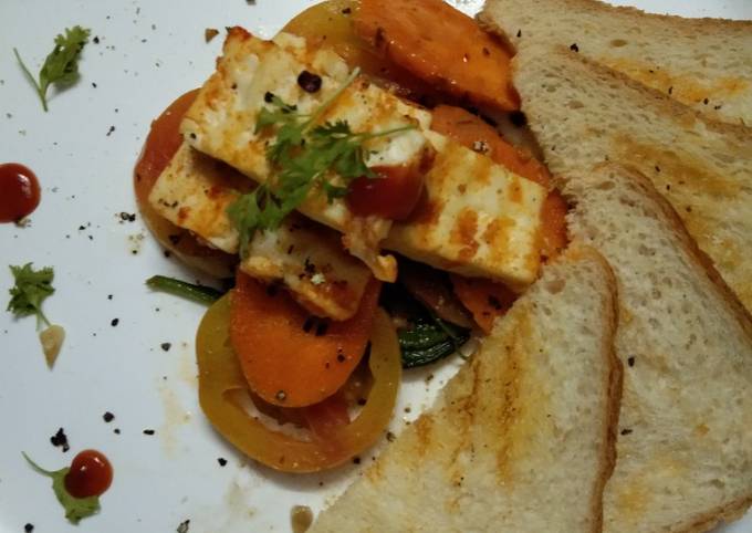 A picture of Grilled vegetables with spinach and Toast.