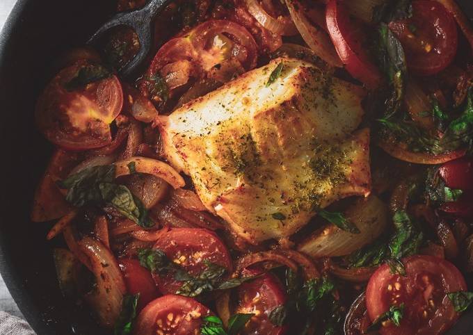 A picture of Pan Fried Cod With Onions & Tomatoes.