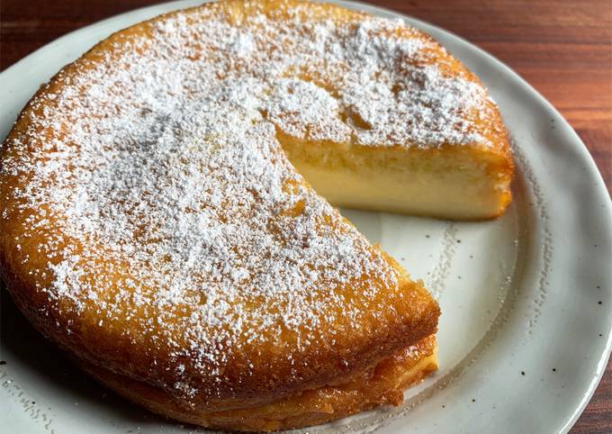 A picture of Magic Cake with Coconut Sponge Top.