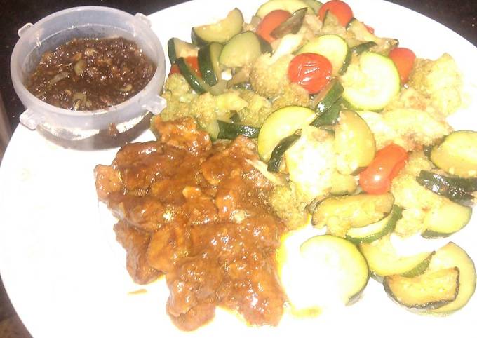 A picture of # local ingredients: beef,courgette,cherry tomatoes  couliflower and brown paste.