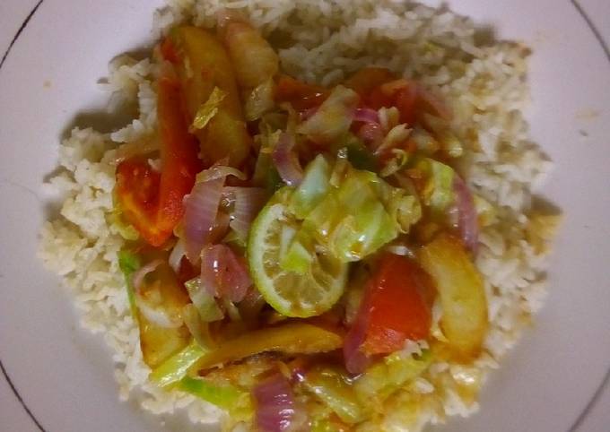 A picture of Rice and stir fried veggies.