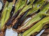 A picture of Char-grilled leeks.