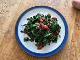 A picture of Pan fried kale with toasted almonds.