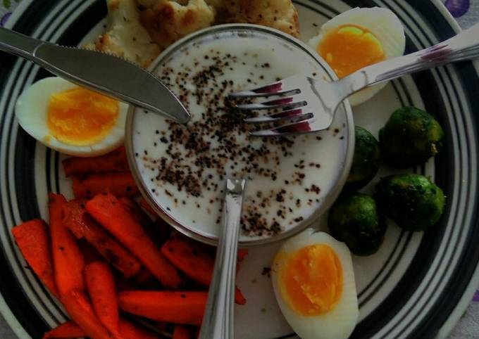 A picture of Vegetable stir fry  and boiled egg.