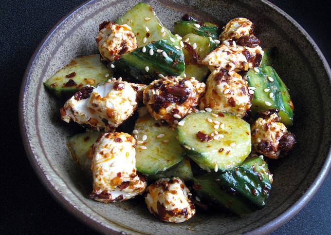 A picture of Cucumber & Cream Cheese with Crispy Chilli Oil.