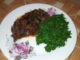 A picture of Green vegetables and wet fry liver.