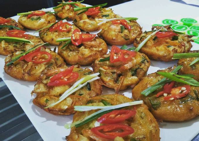 A picture of Vegetables and prawn fritters.