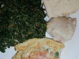 A picture of Ugali, kunde cooked in cream with scrambled vegetable eggs.