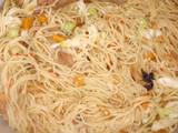 A picture of Spaghetti jollop with vegetables.