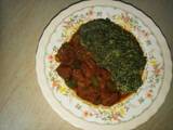 A picture of Wet fry meat with kienyeji vegetables.#author's marathon.