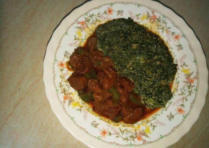 A picture of Wet fry meat with kienyeji vegetables.#author's marathon.