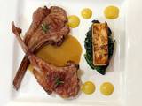 A picture of Lamb chop with Corn puree, celeriac fondant, spinach and mushroom sauce.