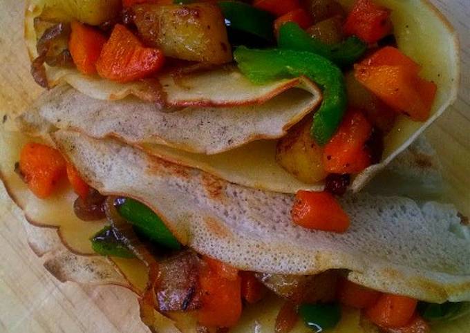 A picture of Stir Fry Veggie Stuffed Crêpes.