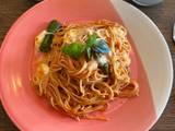 A picture of Simple tomato pasta with mozzarella and padron peppers.