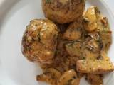 A picture of Meatballs in mushroom cream sauce.