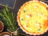 A picture of Pie with broccoli and smoked trout.