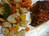 A picture of Roasted, Spiced, and herb crusted chicken with buttery vegetables.