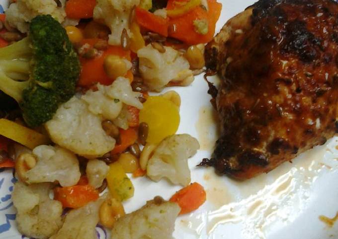 A picture of Roasted, Spiced, and herb crusted chicken with buttery vegetables.