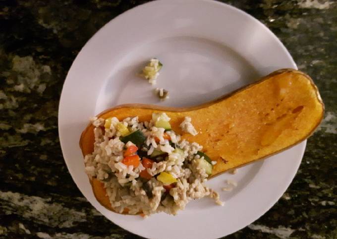 A picture of Butternut Squash with Ground Chicken, Vegetables and Rice.