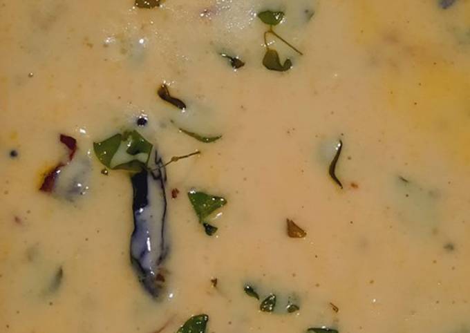 A picture of Moringa leaves in curd curry.