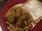 A picture of Turkey Thai curry meatballs with pasta.