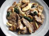 A picture of Sautéed Pork & Oyster Mushrooms with Sage.