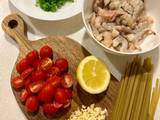 A picture of Spicy Garlic Prawn Pasta with Cherry Tomatoes.