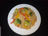 A picture of Noodles with vegetables.