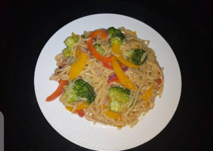 A picture of Noodles with vegetables.