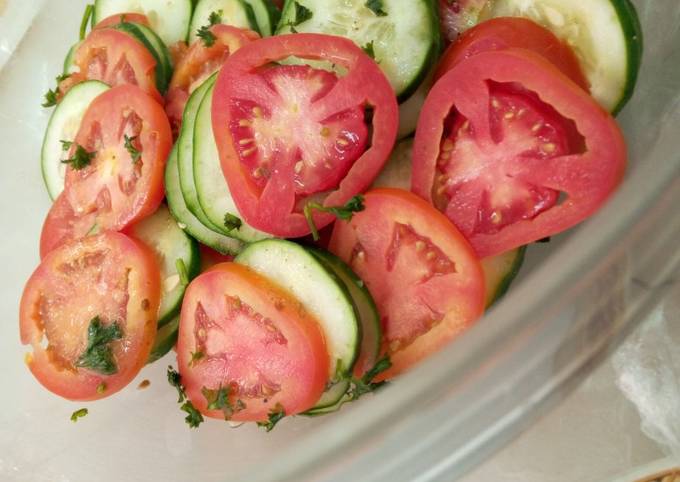 A picture of Tomato and cucumber salsa.