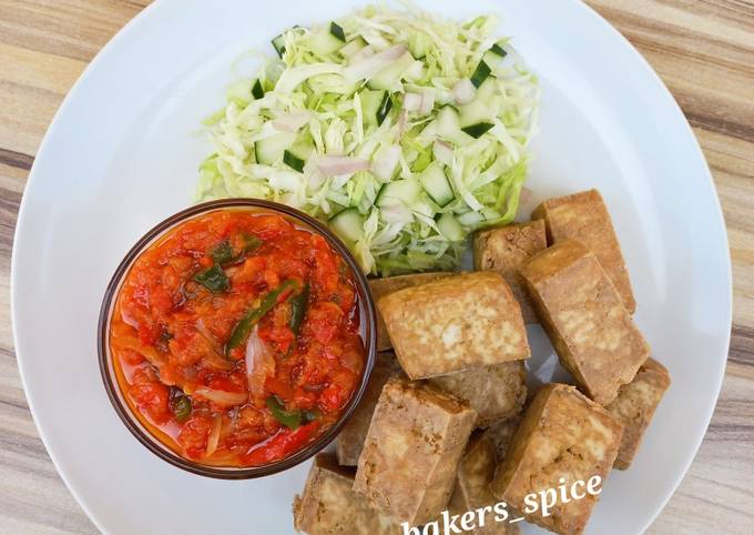 A picture of Awara/Tofu/ Soybeans Cheese with Vegetables & Pepper Sauce.