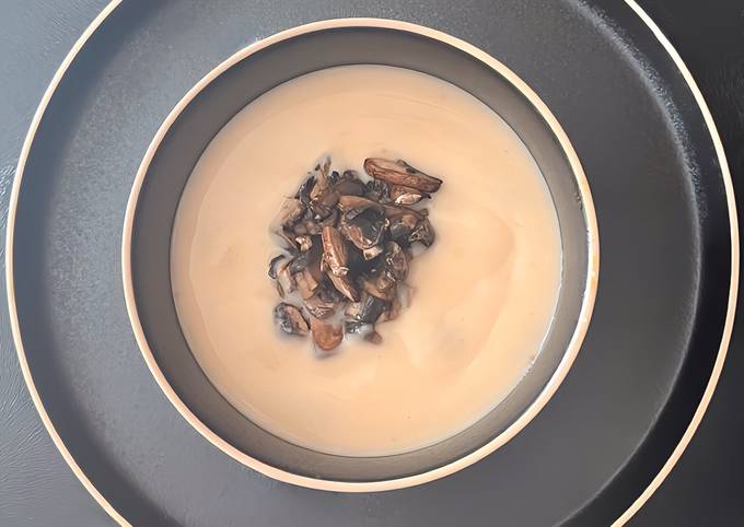 A picture of MUSHROOM & BRIE SOUP WITH NON-ALCOHOLIC BRANDY.