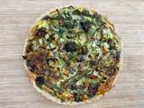 A picture of Quiche with smoked mozzarella and purple sprouting broccoli.