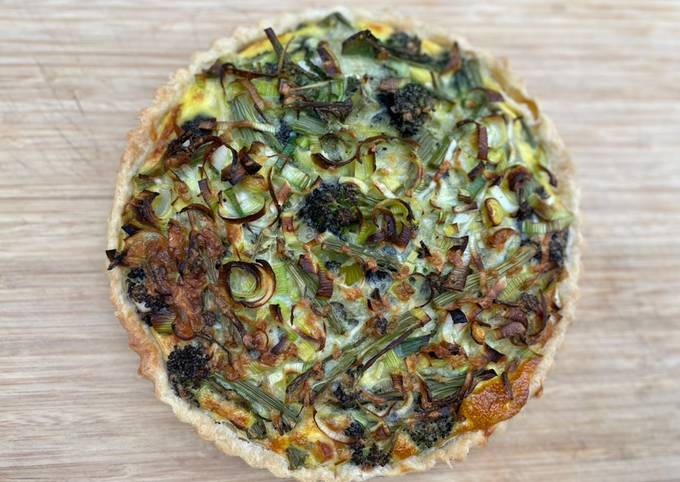 A picture of Quiche with smoked mozzarella and purple sprouting broccoli.