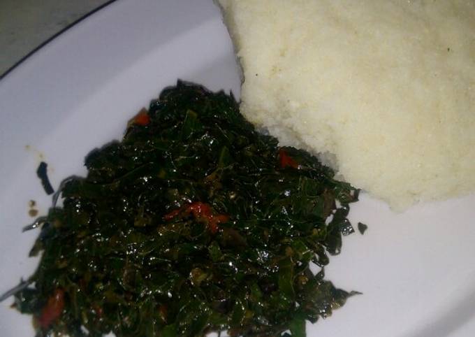 A picture of Fried kales with ugali.