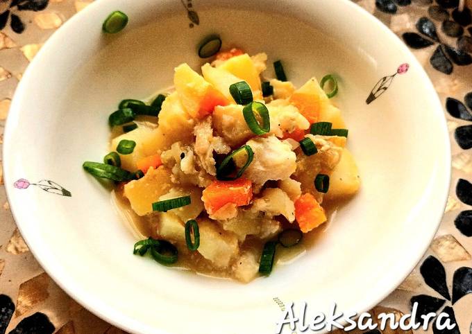 A picture of Seabass with vegetables in the oven.