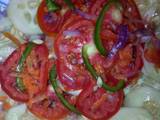 A picture of Ukwaju tomato salad.