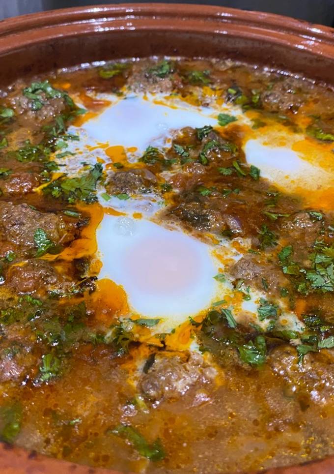 A picture of Kefta Mkaouara – Moroccan lamb and egg tagine.