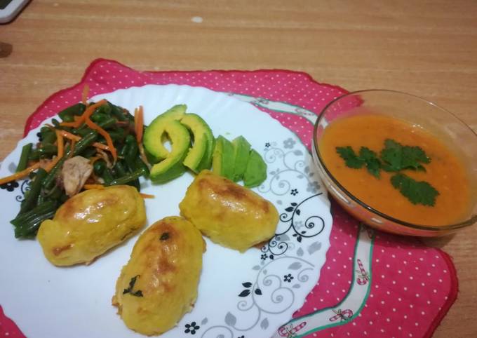 A picture of Baked potato croquettes with pumkin/carrot/tomato soup.