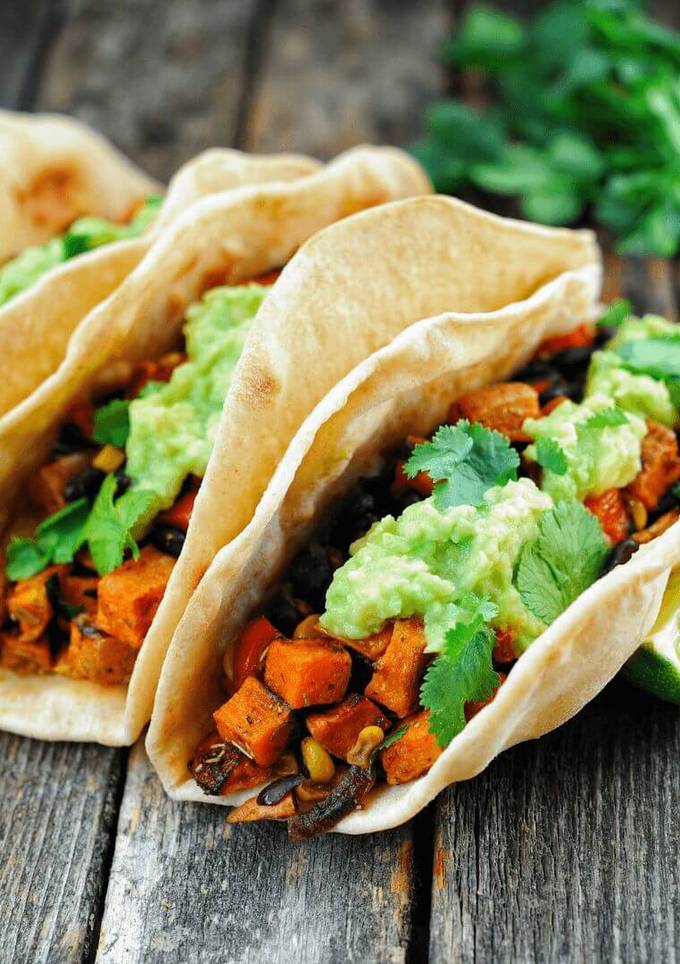 A picture of Sweet Potato, Black Bean, and Salsa Roja Tacos.