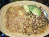 A picture of Githeri and steamed cabbage plus avocado.