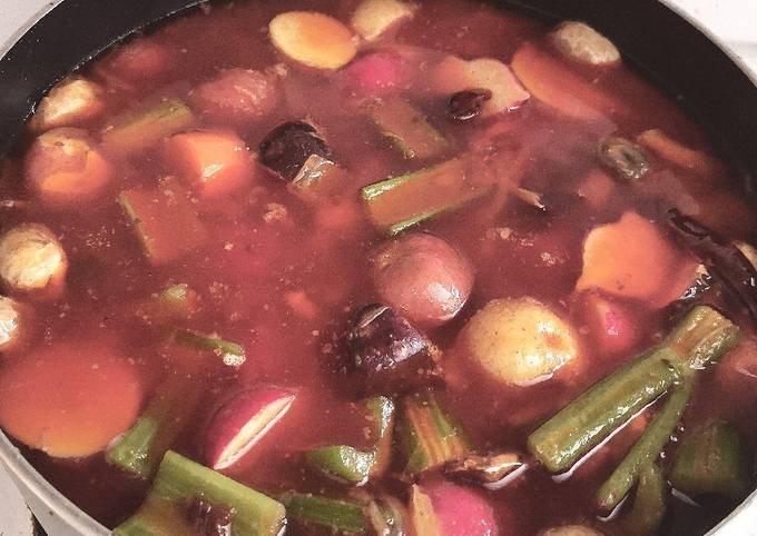 A picture of Beef vegetable stew with Korean chili oil twist.