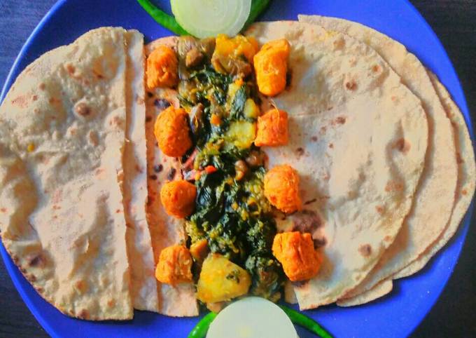 A picture of Palong shak ghonto or Spinach mixed vegetable Curry.