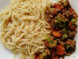 A picture of Broccoli stir fry and spaghetti.