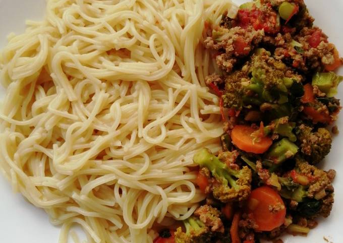 A picture of Broccoli stir fry and spaghetti.